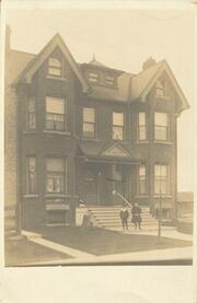 Victor and Theresa Arlidge in front of house at St. Clarens Avenue